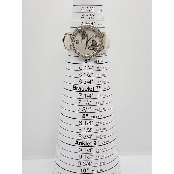 Guess women\'s butterfly face watch. Jeweled bevel.G755990L Working watch main image 9